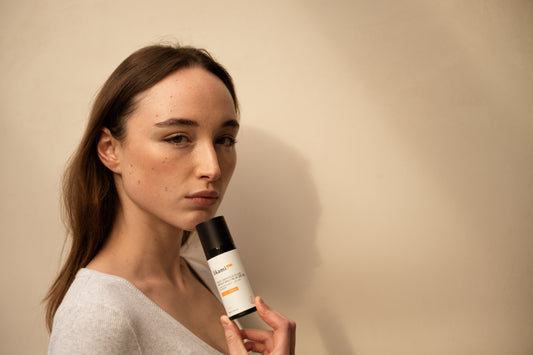 Daily Defence Fluid Broad Spectrum SPF50 - Correct & Brighten