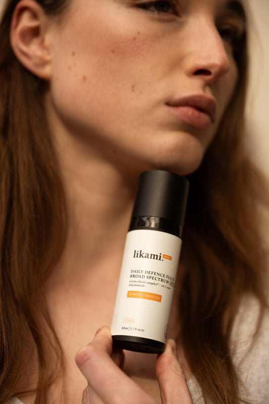 Daily Defence Fluid Broad Spectrum SPF50 - Correct & Brighten