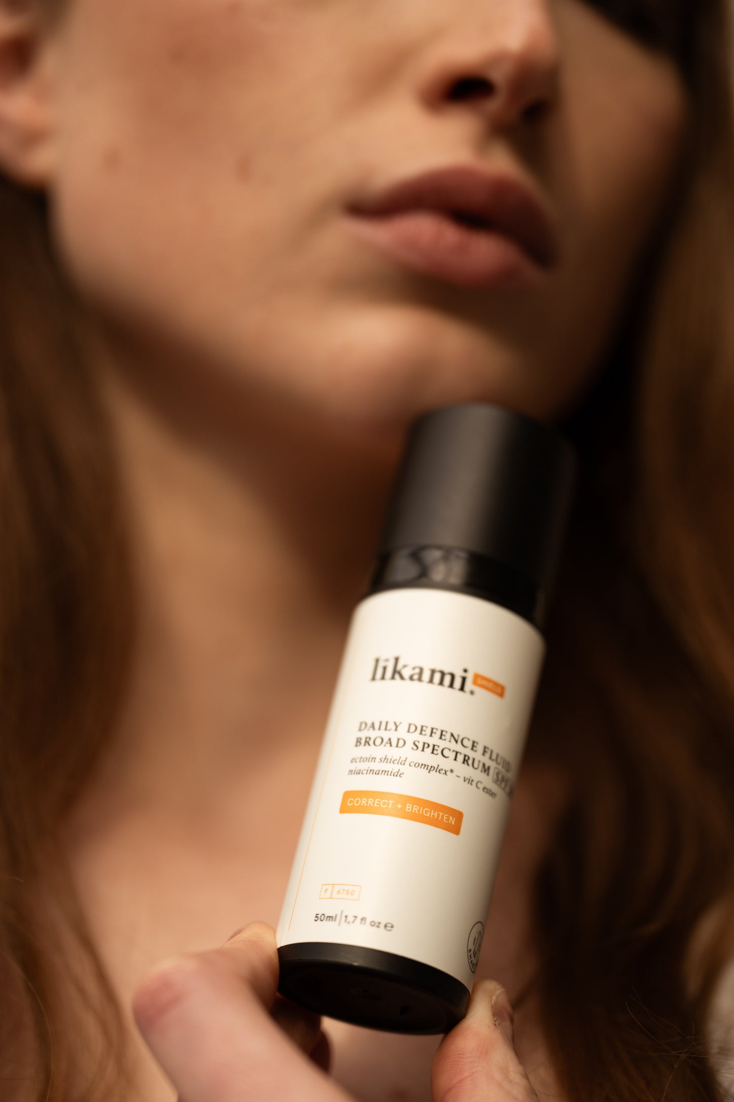 Daily Defence Fluid Broad Spectrum SPF50 - Correct & Brighten